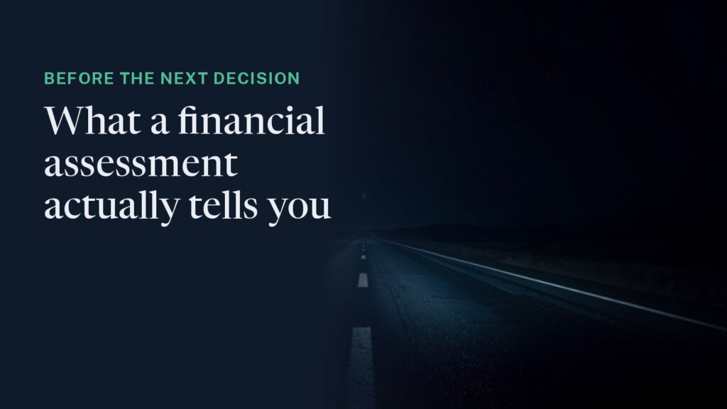 Cover: an empty road at night, lane markings running ahead into complete darkness - the article's own image of running a business without checking its numbers. Overlaid: "Before the next decision - what a financial assessment actually tells you."